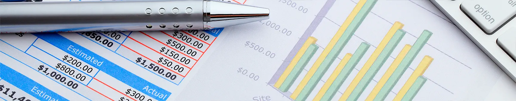 Financial spreadsheets and cost analysis charts with a pen on a desk, representing Mezzo Financial’s professional bookkeeping and financial analysis services for businesses in Central Ohio—including Delaware, Marion, Mansfield, Mount Vernon, and Cardington—and clients nationwide